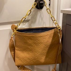 L V shoulder and crossing body bag